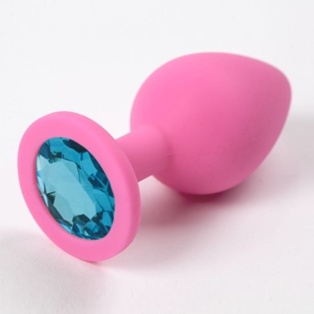 Розовая силиконовая пробка S с голубым стразом