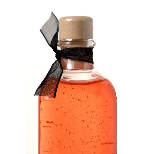 Комплект для сладких игр Orgie Lips Massage со вкусом клубники (сладкое массажное масло и перо), 100 мл