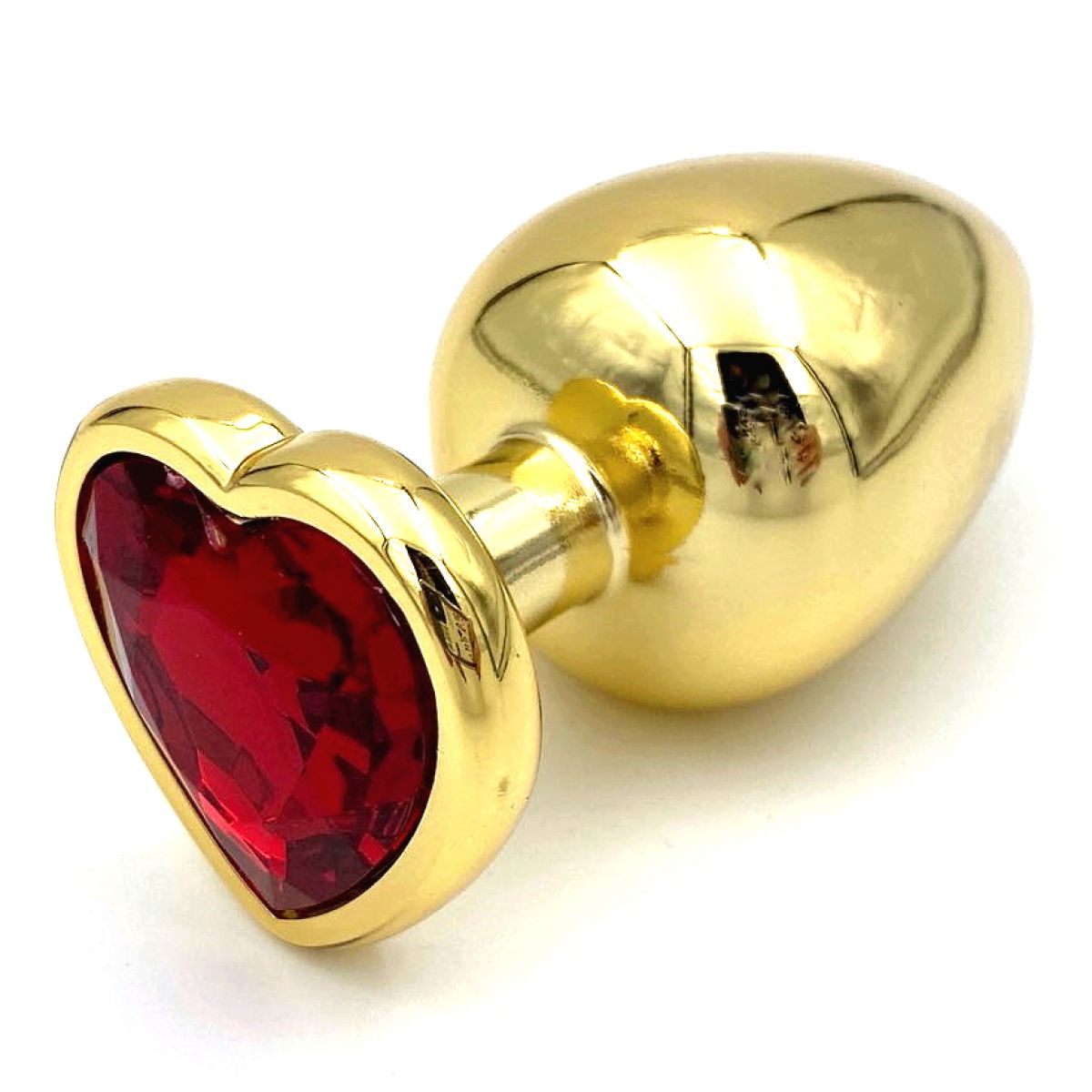 Золотая металлическая анальная пробка L с красным камушком в виде сердечка