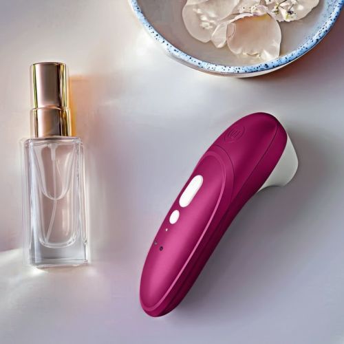 Бесконтактный вакуумно-волновой стимулятор клитора Womanizer Pro розовый